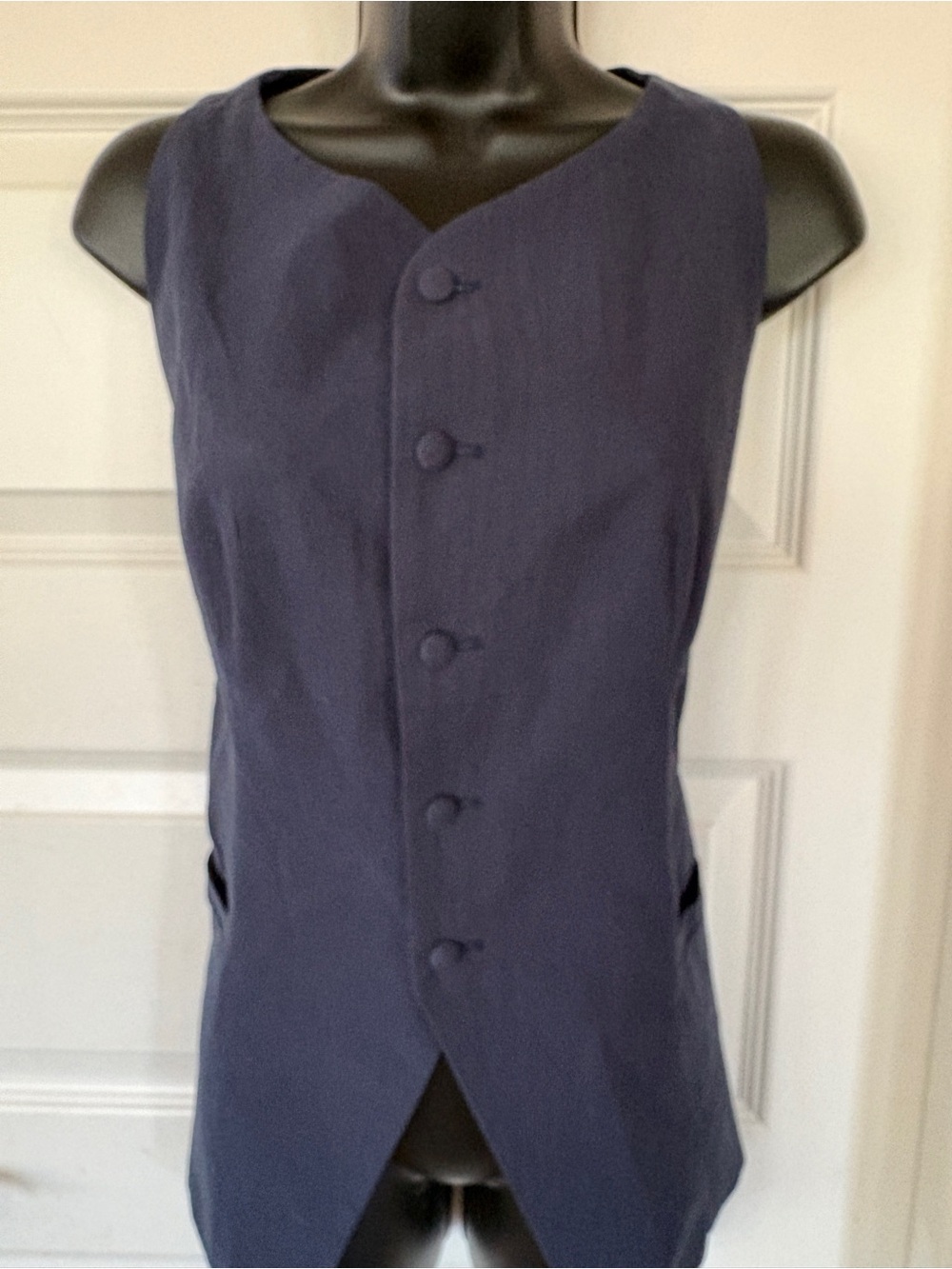 Womens Tailored Dark Navy Button Vest. Longer length with open cut out on bottom